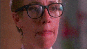Woman takes off glasses, lets down hair, becomes far more attractive.