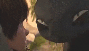Toothless regurgitating fish, for Hiccup to eat