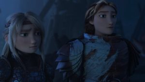 Astrid & Valka standing, appear concerned and sad