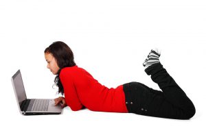 Girl using laptop computer