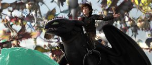 Hiccup making a point with his dragon friends