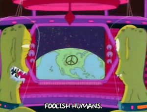 Aliens looking at Earth that has now disarmed itself. "Foolish humans".
