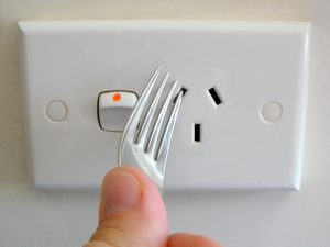 Sticking fork into power point