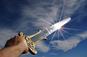 sword being held to sky