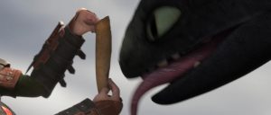 Toothless licking parchment.