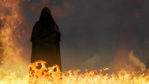 Evil hooded figure surrounded by flames.